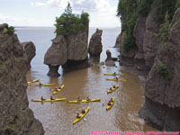 high tide with kayaks