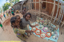 children and hat vendor