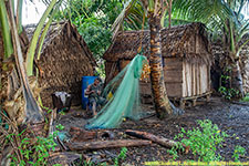 fisherman mending net