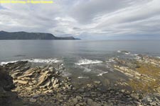 shore below lighthouse