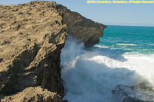 surf against the cliff