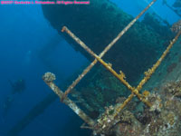 wide angle view of wreck with divers