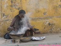woman cooking outside