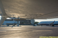 taxiing past commercial flights