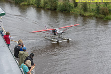 floatplane next to boat