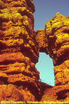 rock arch between hoodoos