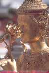 gold statue face